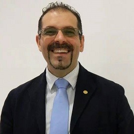 Dr. Carlos Muriel